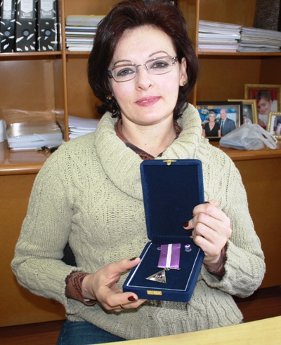 Coordenadora da Defesa Civil de Pinheirinho do Vale é agraciada com Medalha